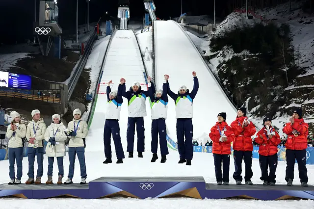 Mixed team ski jumping podium