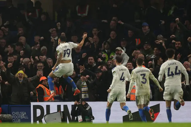 Leeds United's Swiss striker #19 Noah Okafor (L) celebrates after scoring their second goal during the English Premier League football match between Chelsea and Leeds United at Stamford Bridge in London on February 10, 2026.