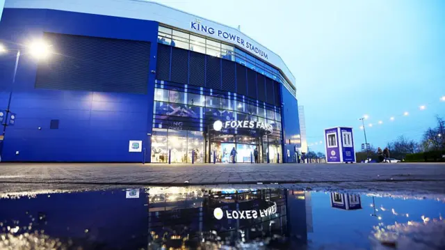 A puddle on the ground outside Leicester's King Power Stadium