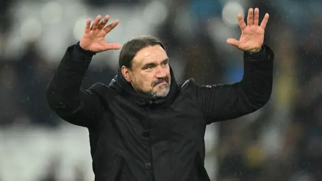 Daniel Farke, manager of Leeds United, gestures to his team's supporters