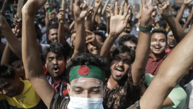 People gather to celebrate the fall of Bangladesh Prime Minister Sheikh Hasina in August 2024 after a student-led protest