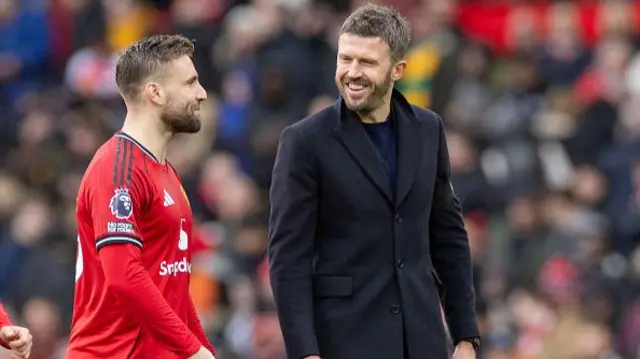 Michael Carrick and Luke Shaw of Manchester United F.C. celebrate