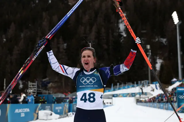 Julia Simon reacts at the finish line