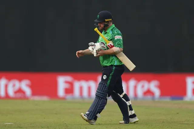 Paul Stirling of Ireland walks off the field after retiring hurt