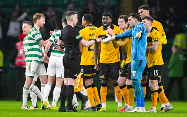 Livingston players appeal to referee Calum Scott