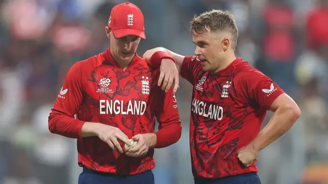 Harry Brook of England talks to Sam Curran of England in the final over during the ICC Men's T20 World Cup India & Sri Lanka 2026 match between England and Nepal