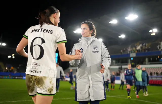Slegers shakes hands at FT