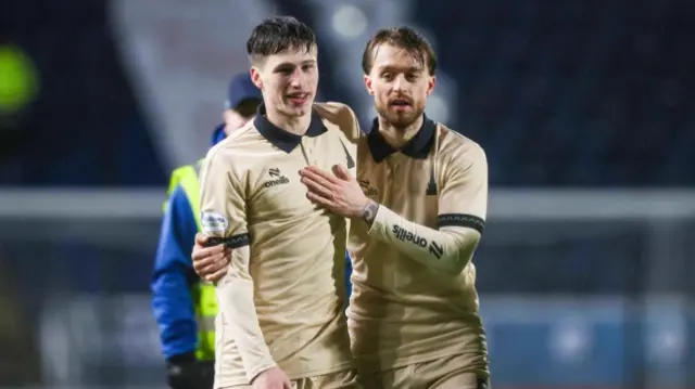 Falkirk's Ben Broggio (L) and Brad Spencer celebrate their side's 1-0 victory