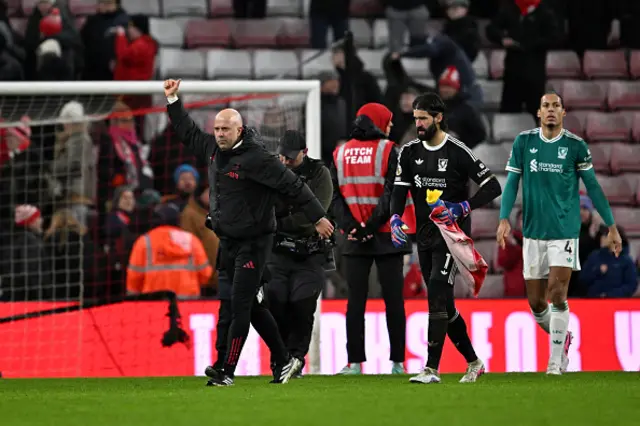 Arne Slot, Manager of Liverpool, acknowledges the fans