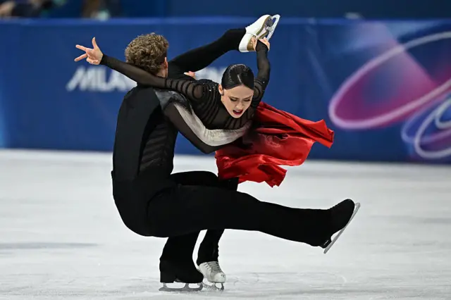 USA's Evan Bates and Madison Chock compete