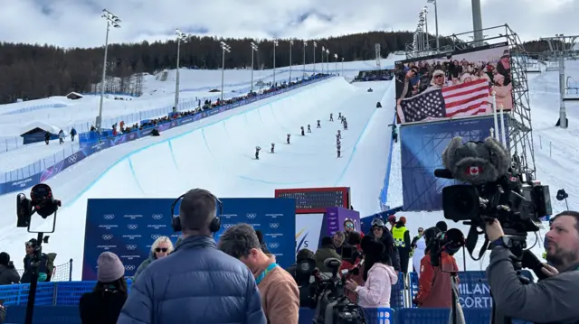 Slippers ski down halfpipe