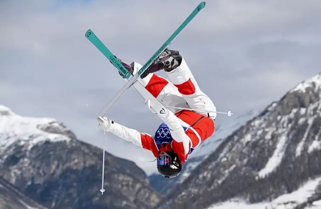 A freestyle skier doing a trick at the Winter Olympics