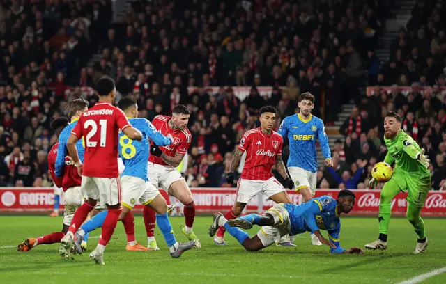 Jose Sa makes a save from Morato
