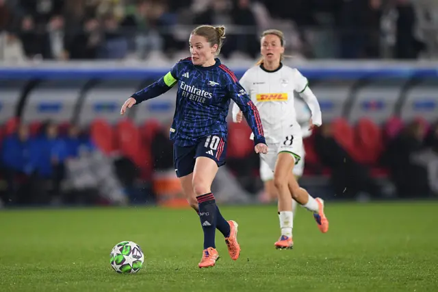 Arsenal captain Kim Little drives upfield with the ball