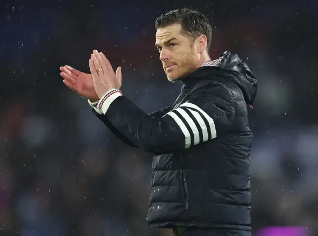 Burnley manager Scott Parker applauds the fans