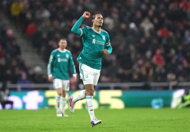 Virgil van Dijk of Liverpool celebrates
