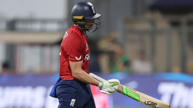 Jos Buttler of England looks dejected as he leaves the field after being caught out by Rovman Powell