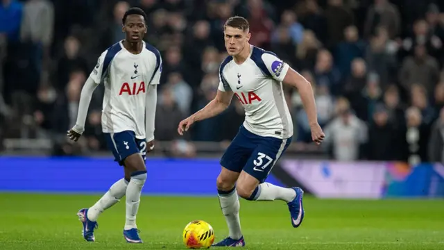 Micky van de Ven on the ball