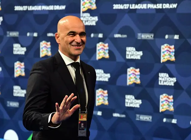 Roberto Martinez looks on