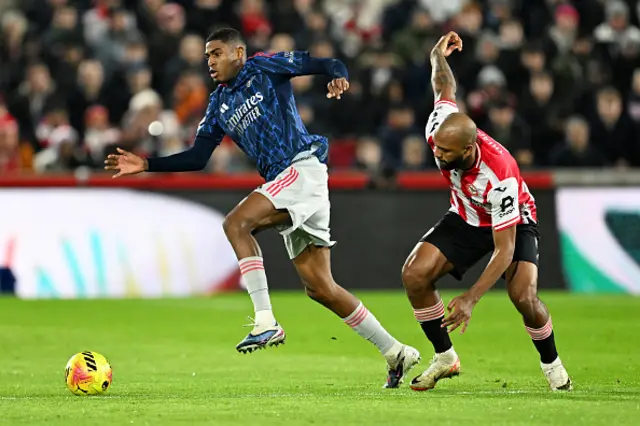 Cristhian Mosquera of Arsenal is challenged by Igor Thiago