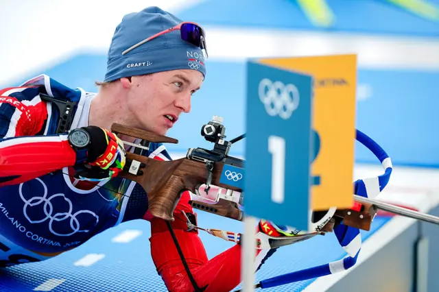 Johan-Olav Botn prepares to take a shot during the 20km event