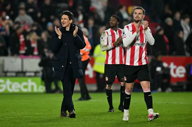 Brentford's Irish head coach Keith Andrews applauds the fans
