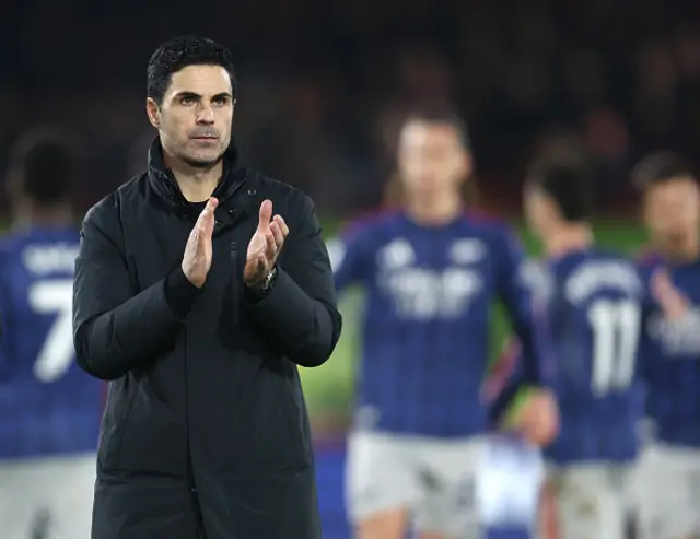 Arsenal manager Mikel Arteta applauds the fans