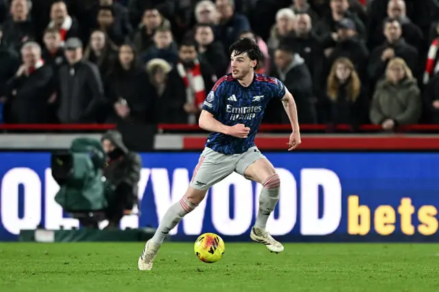 Declan Rice of Arsenal runs with the ball