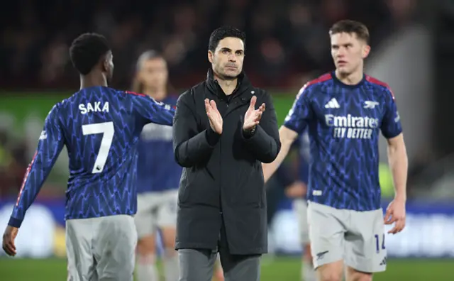 Arsenal manager Mikel Arteta applauds the fans