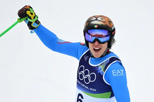 Federica Brignone celebrates at the end of her run