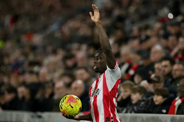 Michael Kayode prepares to take a throw in