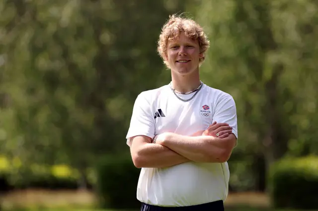 Huw Nightingale poses with his arms folded