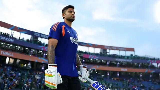 Suryakumar Yadav of India looks on as he takes to the field during the warm up