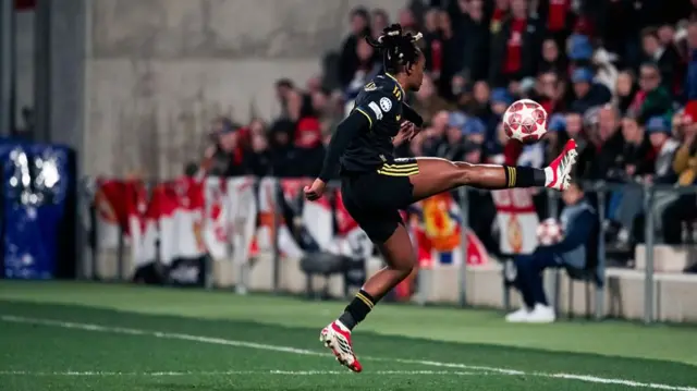 Melvine Malard controls the ball