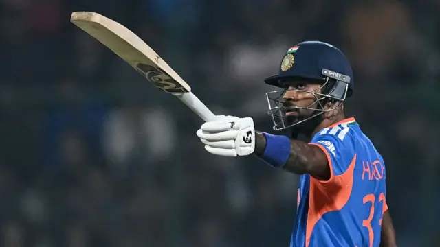 India's Hardik Pandya celebrates after scoring a half-century