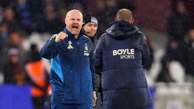 Sean Dyche celebrates next to Nuno Espirito Santo