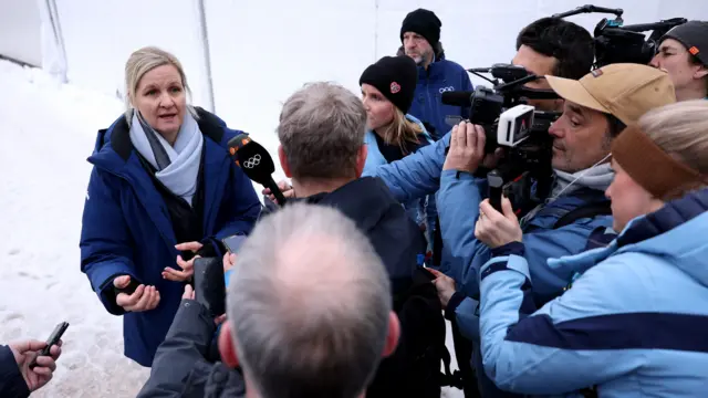 Kirsty Coventry speaks to reporters