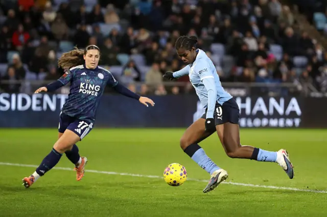 Khadija Shaw is blocked by Julie Thibaud