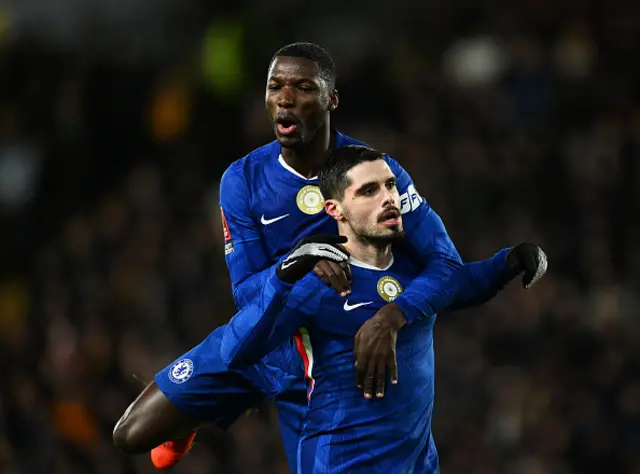 Pedro Neto of Chelsea celebrates scoring his team's first goal with teammate Moises Caiced