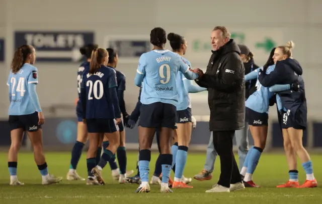 Manchester City manager Andree Jeglertz celebrates after the match