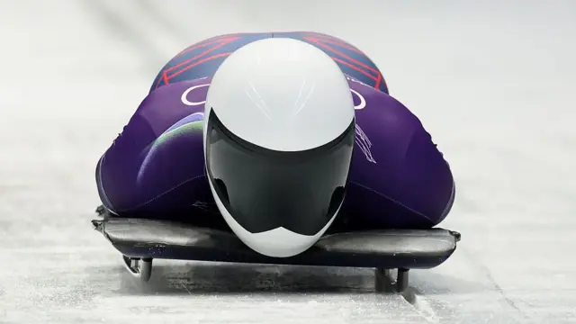 Matt Weston sliding on his sled in the skeleton