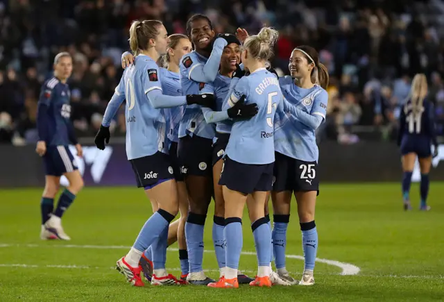 Man City players celebrate