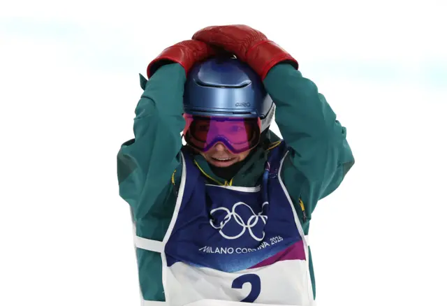 Scotty James from Australia reacts during the Men's Snowboard Halfpipe of the Snowboarding competitions at the Milano Cortina 2026 Winter Olympic Games, in Livigno, Italy