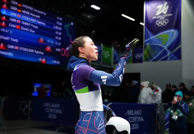 Great Britain's Tabitha Stoecker celebrates after heat two of the Women's Skeleton at the Cortina Sliding Centre, on day seven of the Milano Cortina 2026 Winter Olympics, Italy.