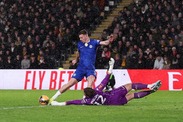 Liam Delap of Chelsea fails to score as Dillon Phillips