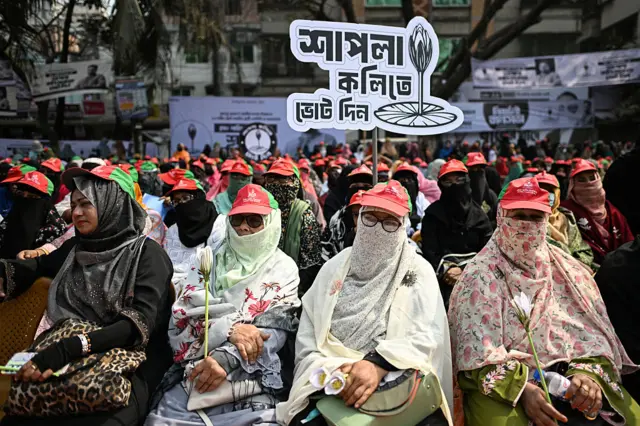 Jamaat-e-Islami party-led alliance supporters attend a rally ahead of Bangladesh's general election in Dhaka on February 8, 2026. (Photo by Sajjad HUSSAIN / AFP via Getty Images)
