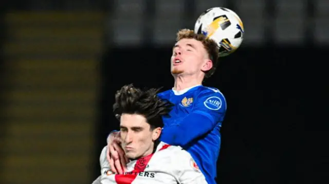 Airdrieonians' Chris Mochrie and St Johnstone's Adam Forrester