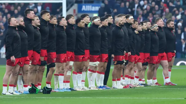 Wales line up for the anthems at Twickenham