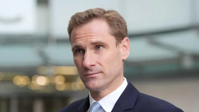 Chris Philp stands outside BBC Broadcasting House