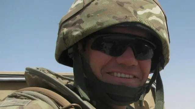 A man in a military uniform.